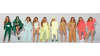 a group of women in different colors standing next to each other